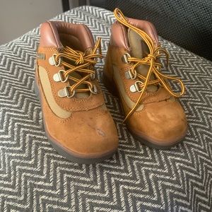 Size 9 Toddler Timberland Boots. Stain on front right boot. See pics!